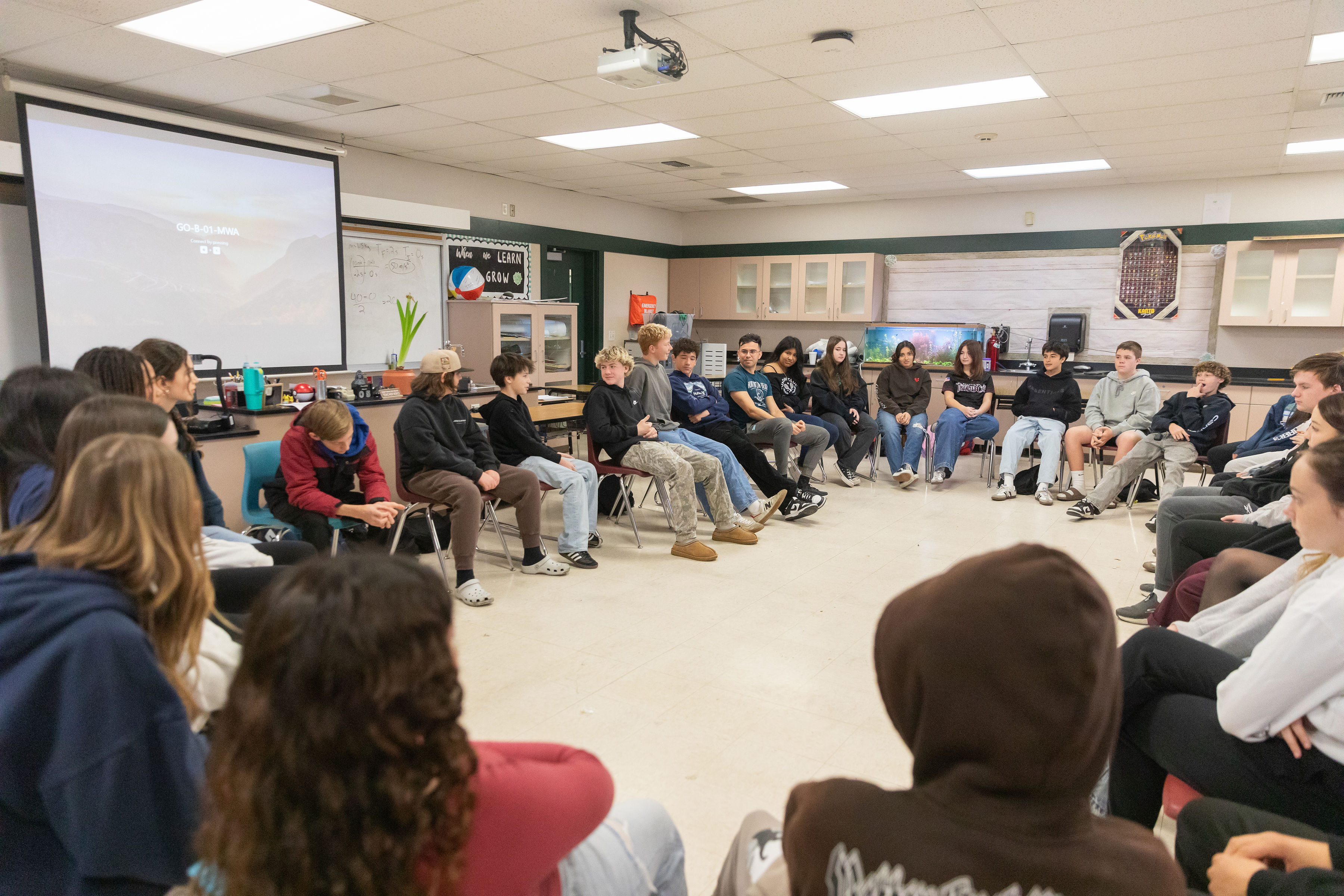 Granite Oaks Students talking in a circle.